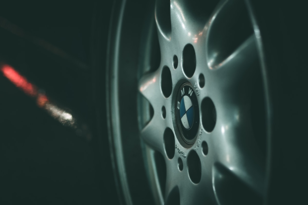 precision-machined 5-spoke wheel on dark surface